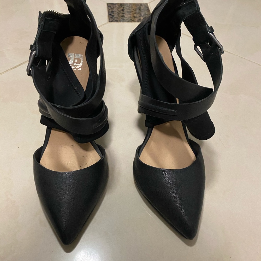 Joe’s black heels
